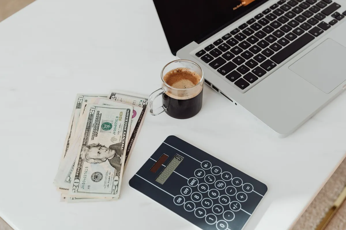 organizing finances on laptop