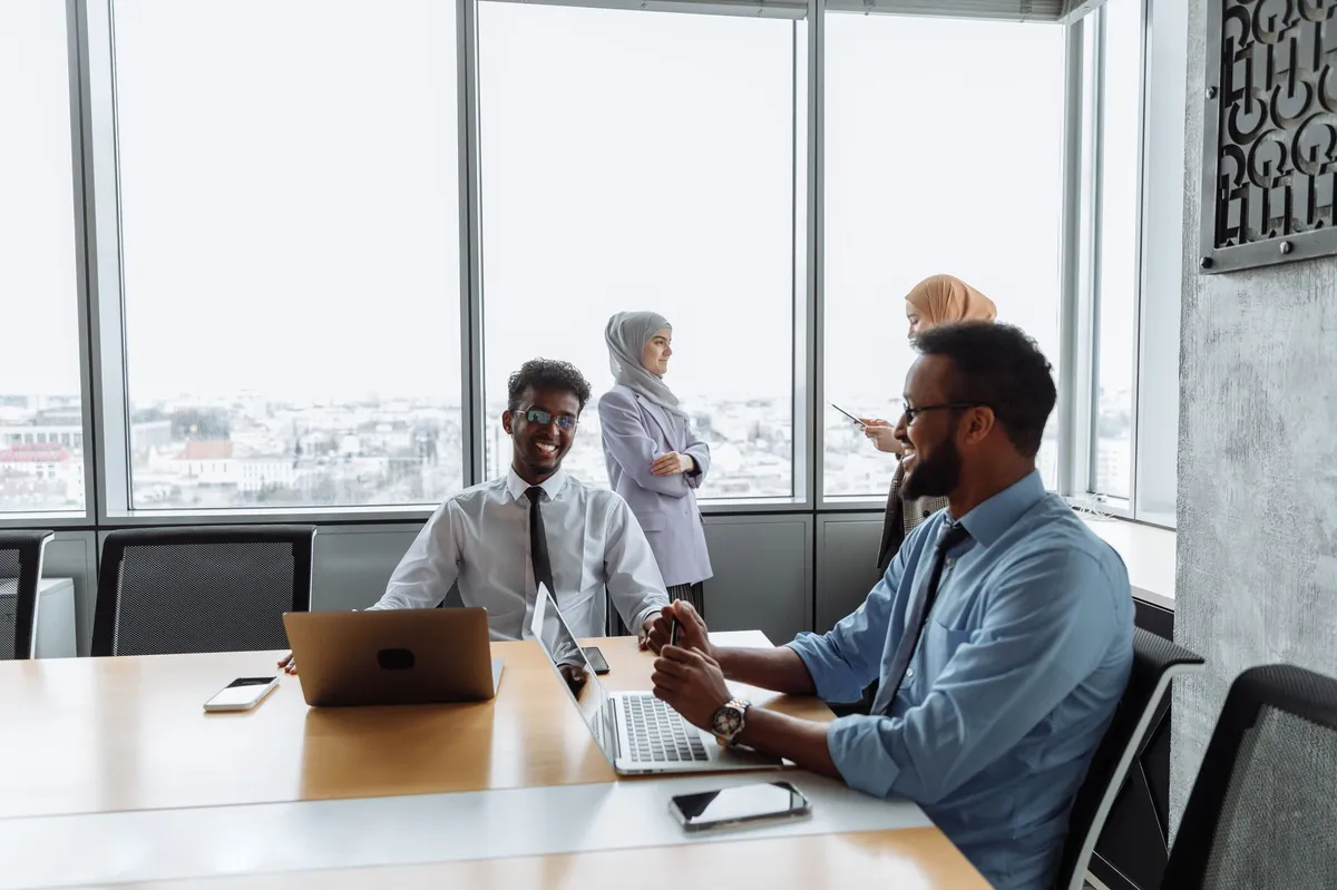bank employees discussing technology