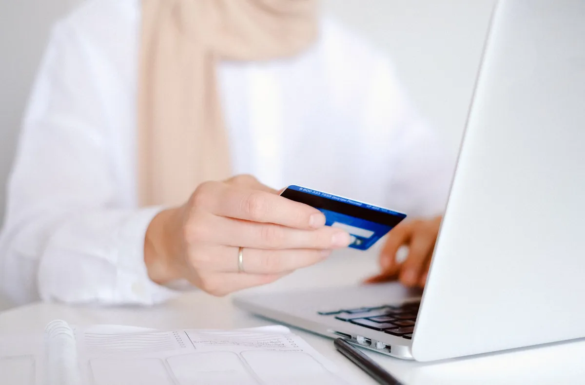 person using laptop for banking