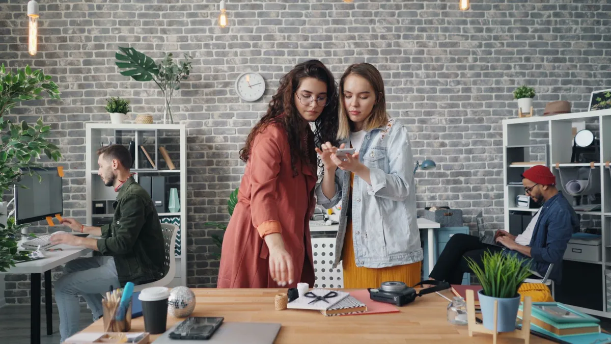 office workers collaborating on AI project