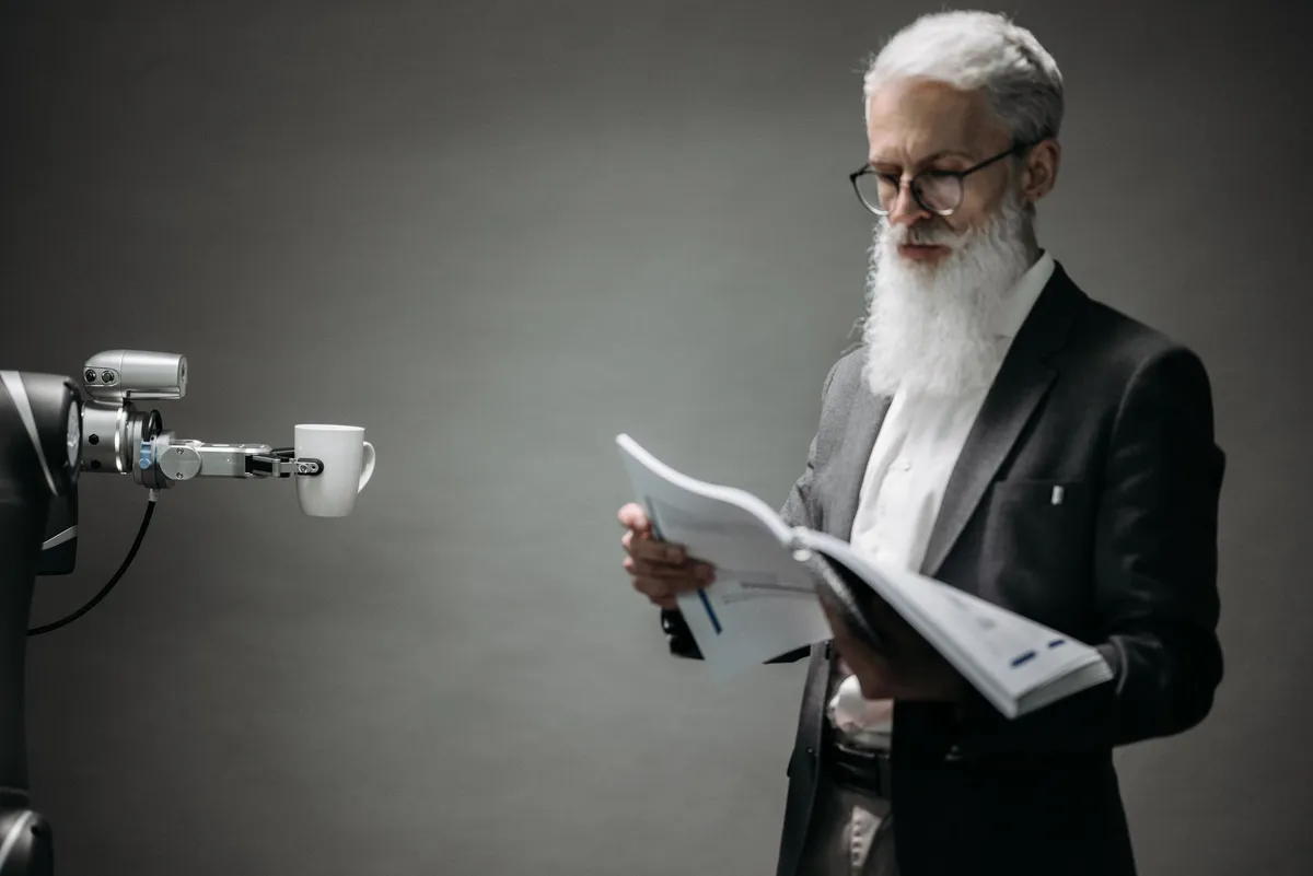 older worker collaborating with AI