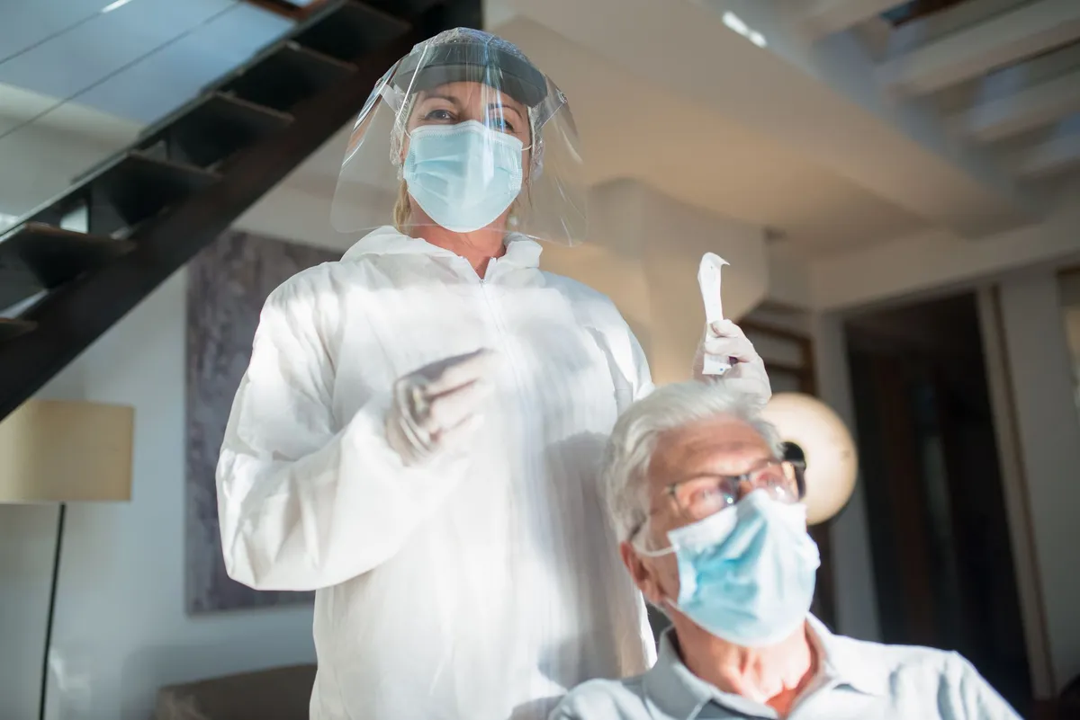 healthcare worker assisting elderly