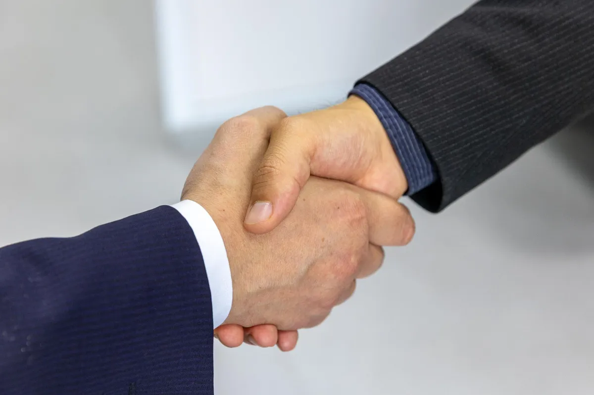 corporate partnership handshake