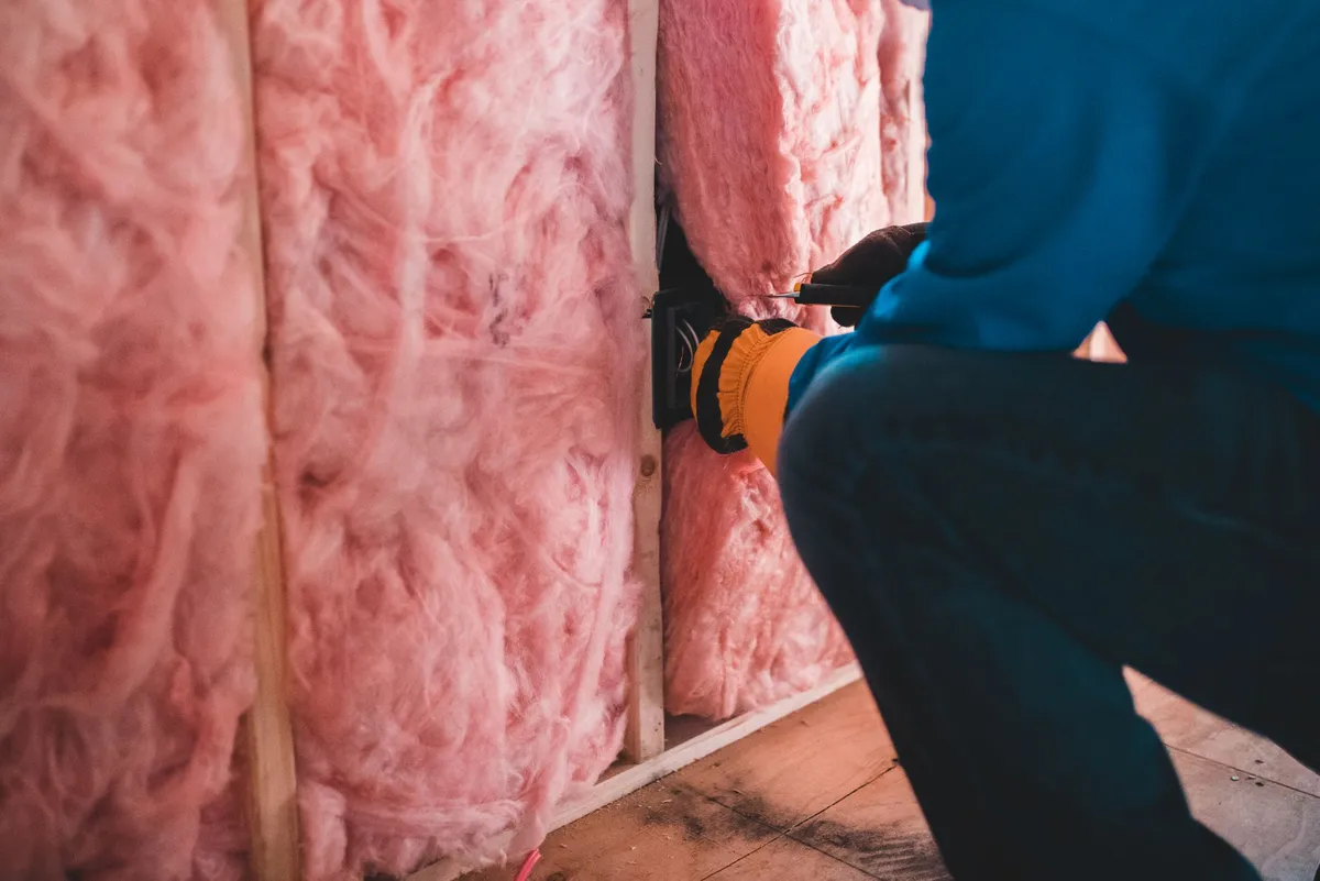 insulation installation at a construction site