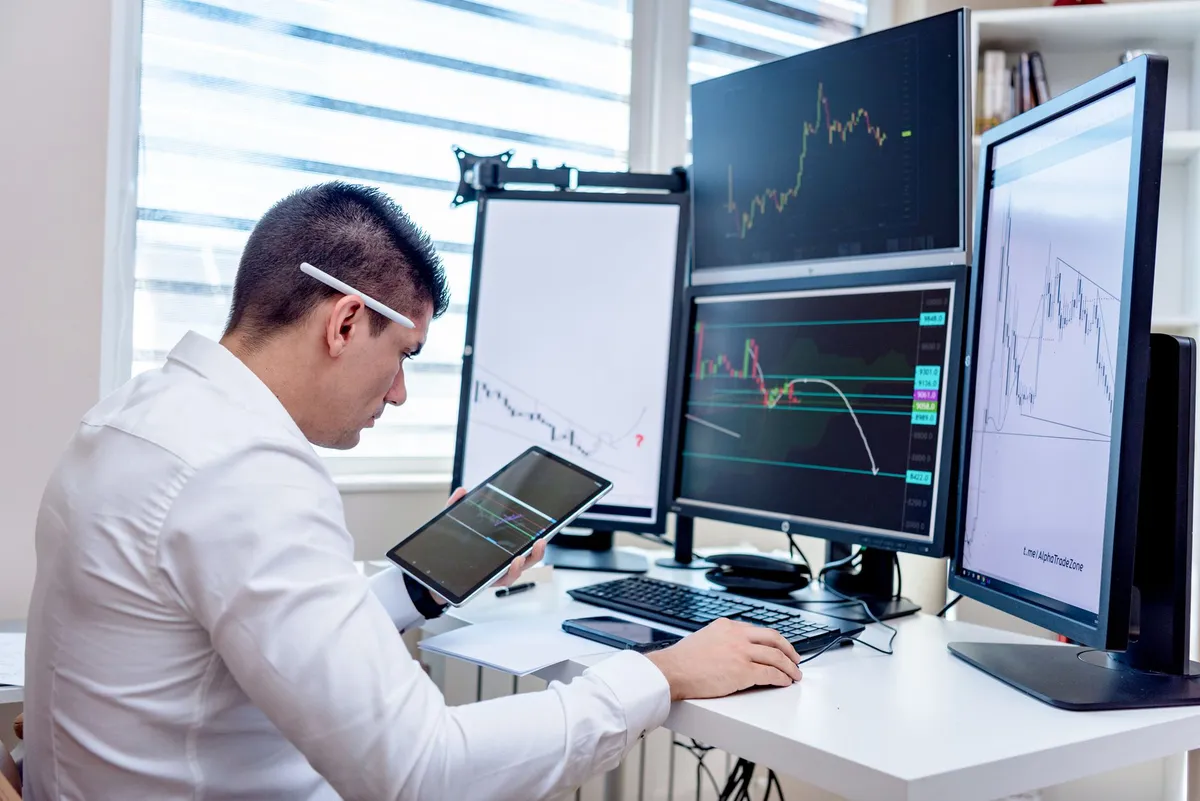 anxious investor checking stocks