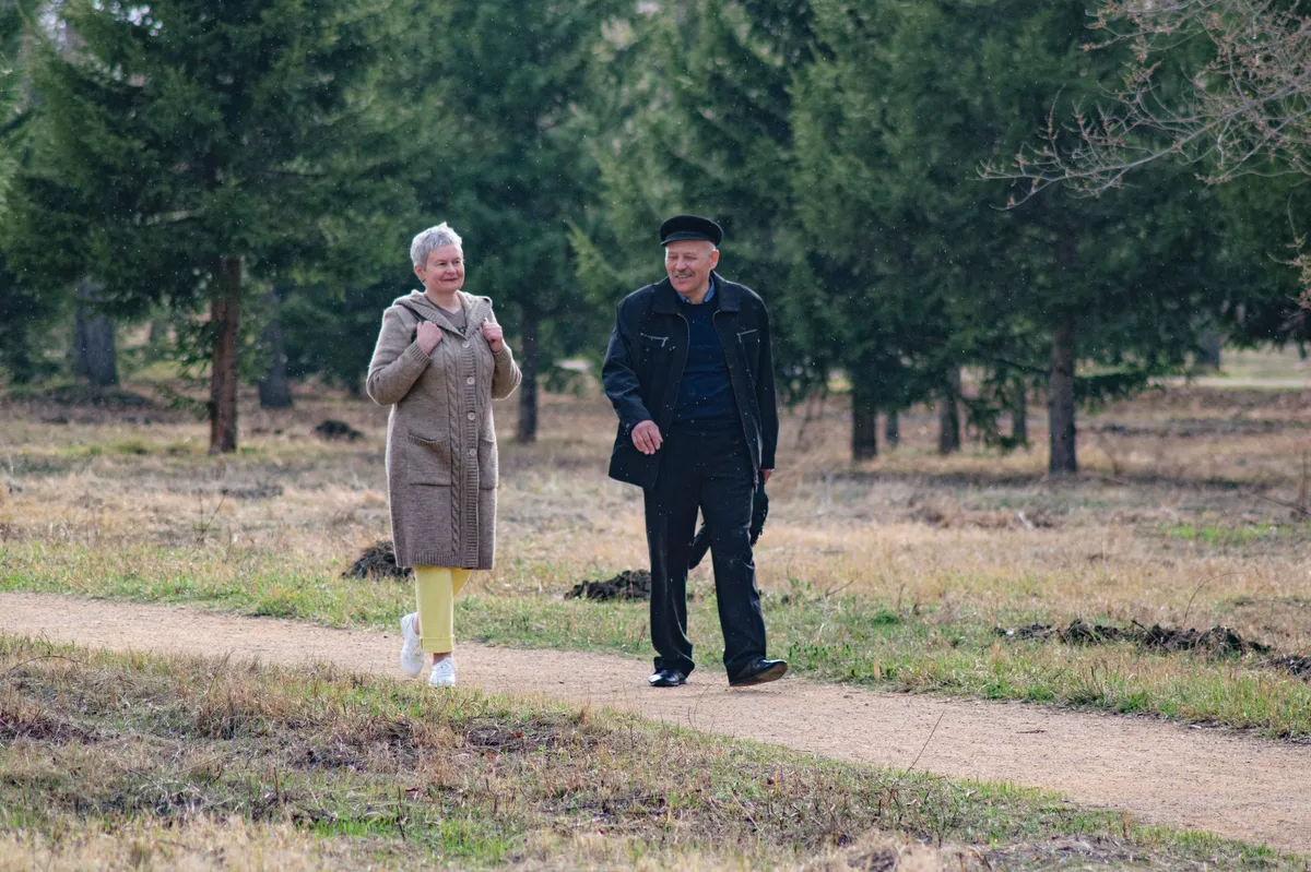 elderly couple on outdoor walk