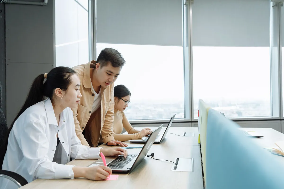 office workers using technology