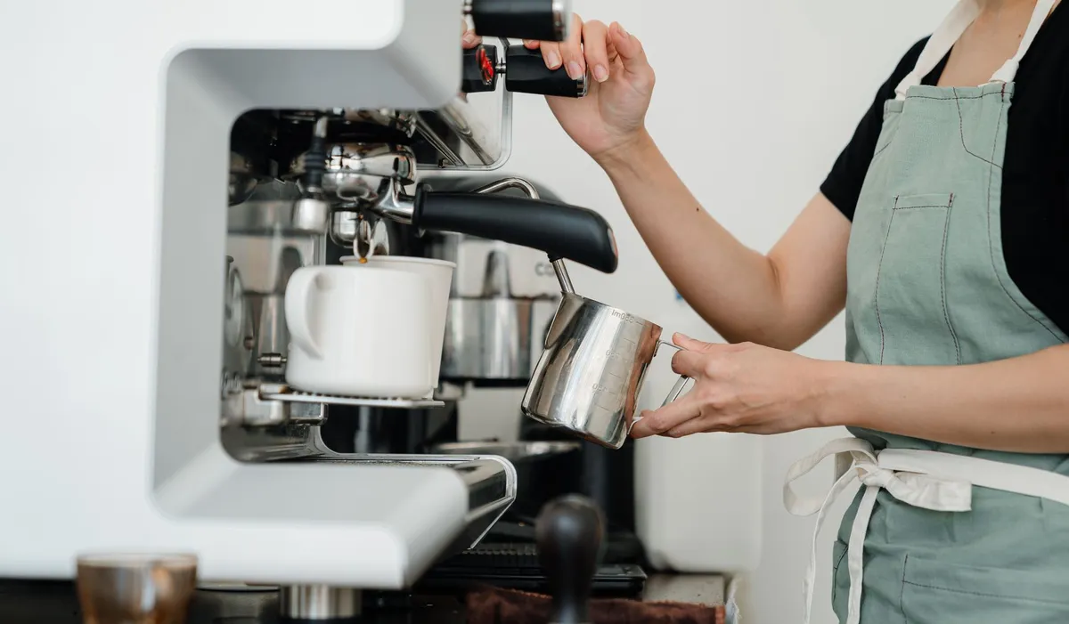 barista making coffee