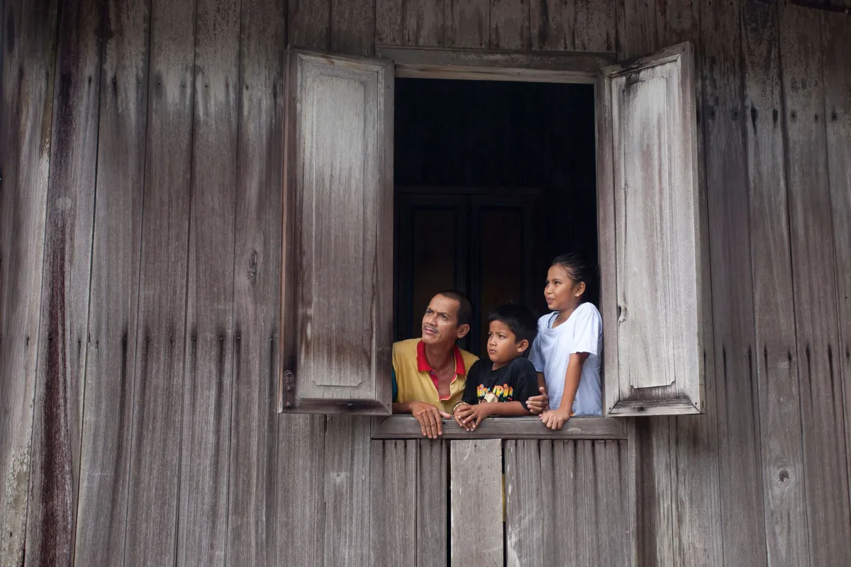 a family looking at homes