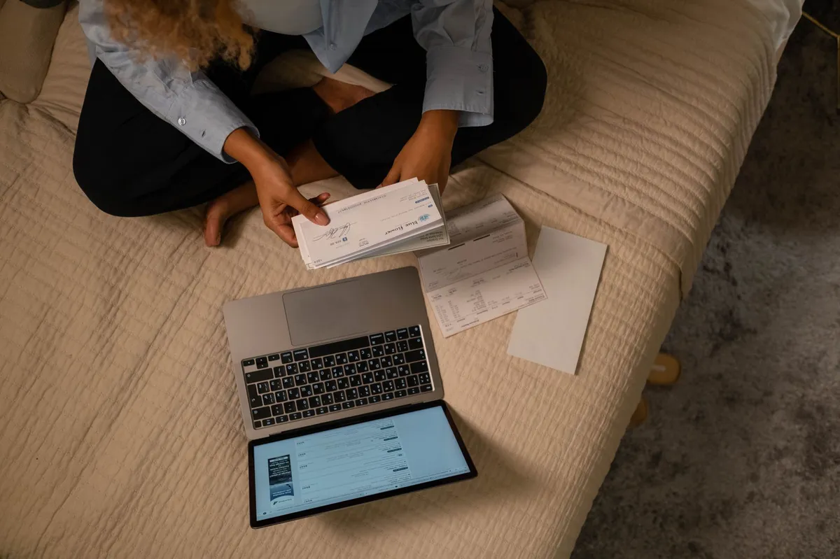 worried person checking bank account