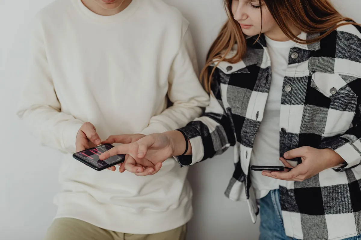 people engaging with mobile trading apps
