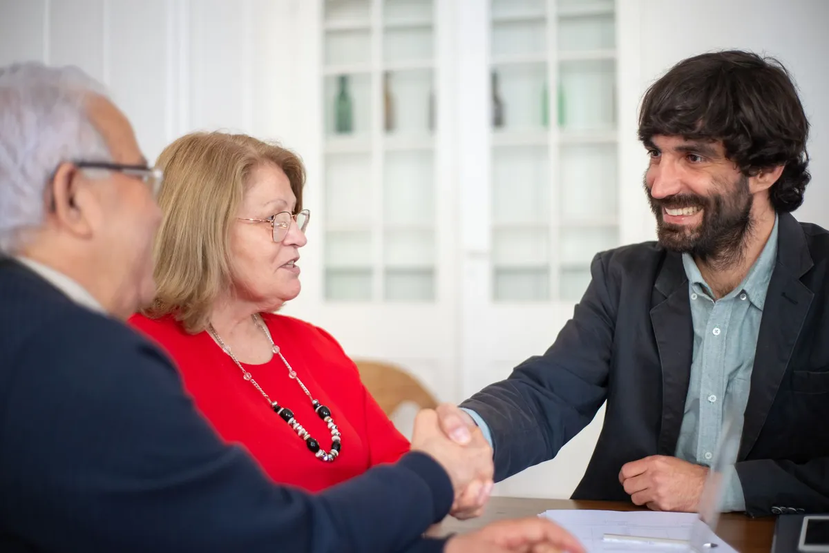 happy clients meeting advisor