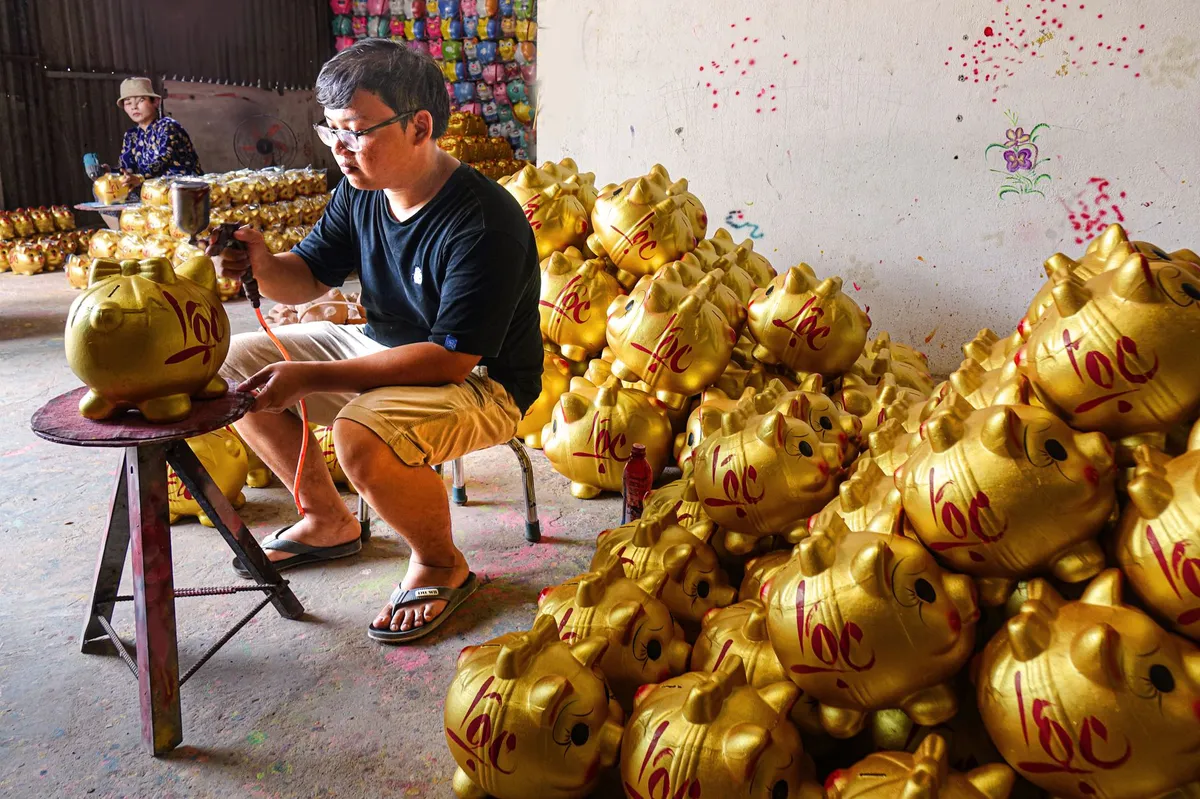 diverse group of children with piggy banks