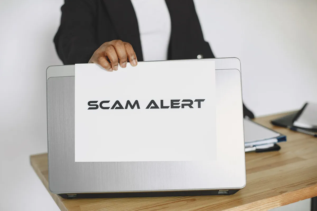 person reporting a scam online