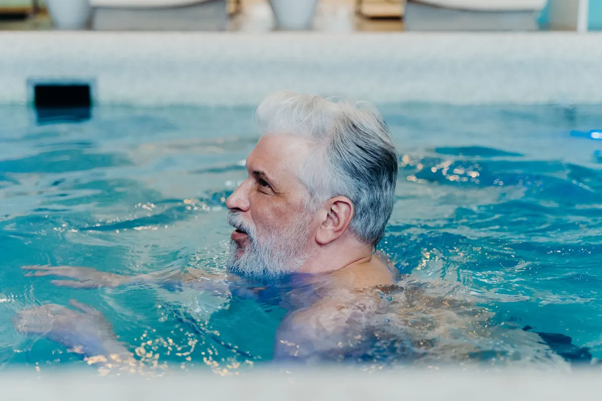 elderly person swimming