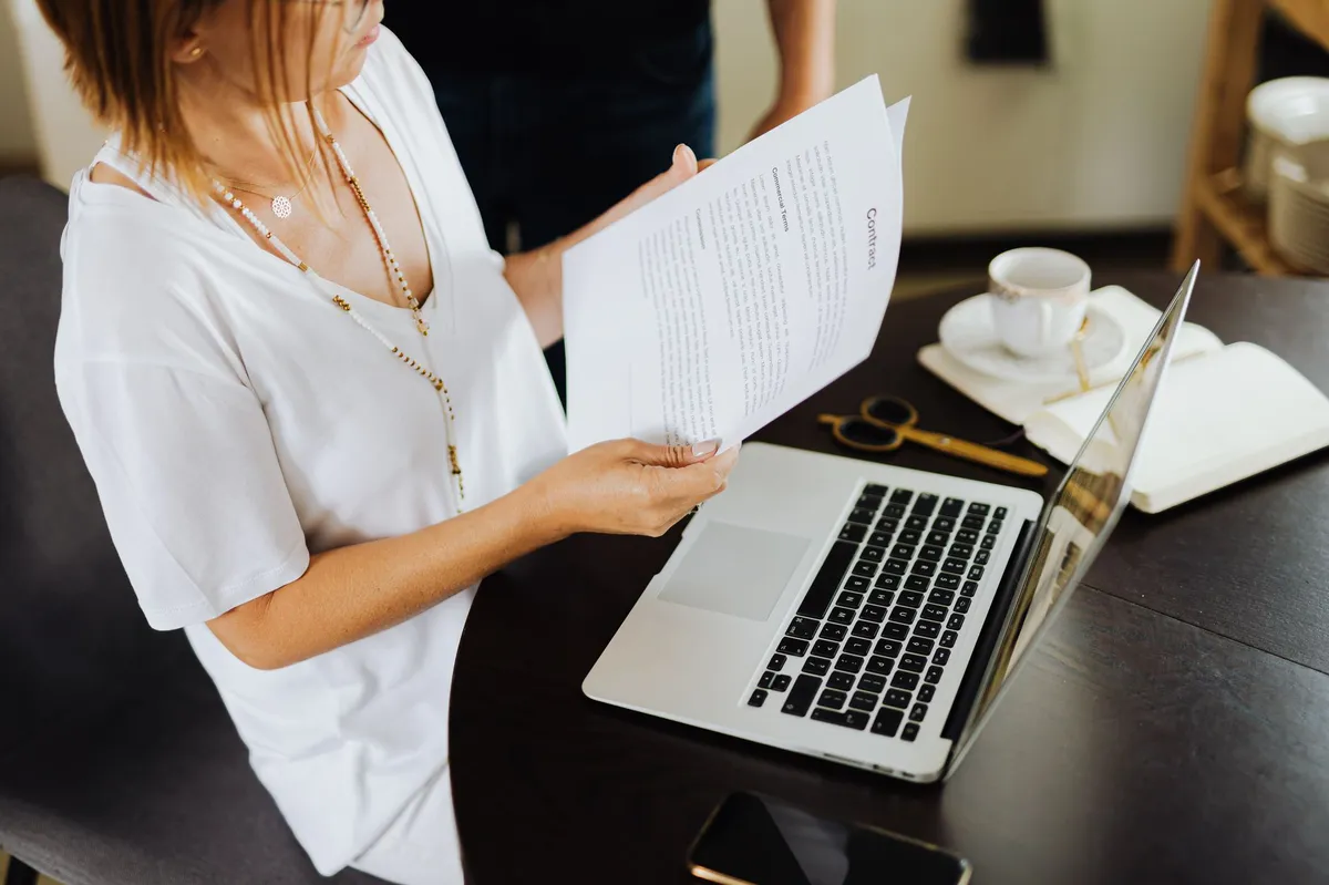 woman reading terms and conditions