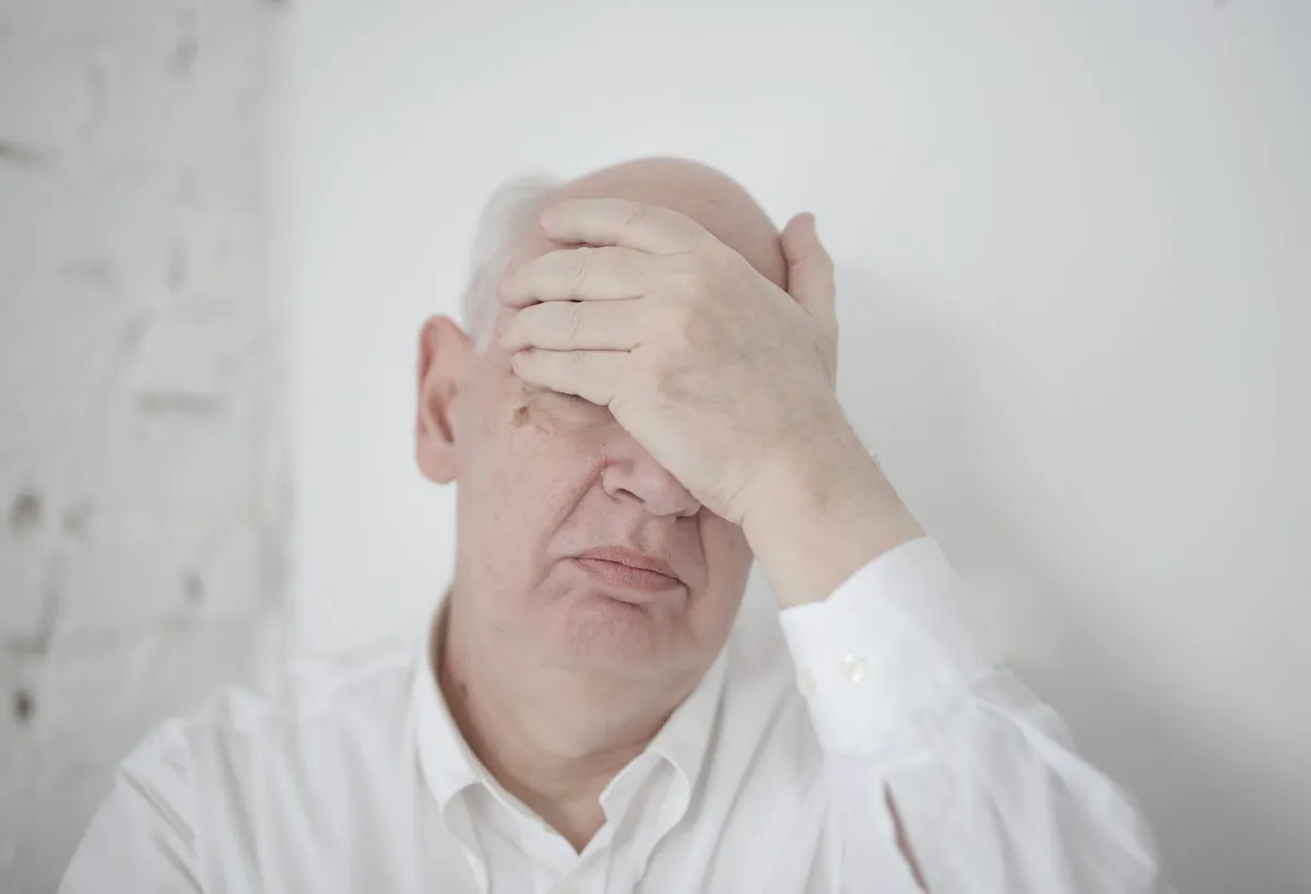 worried retiree looking at finances