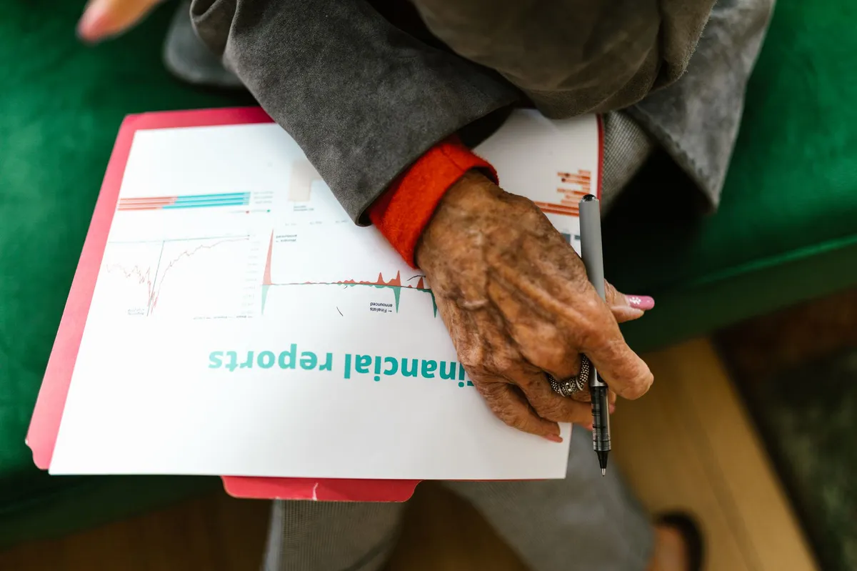 woman reviewing financial documents
