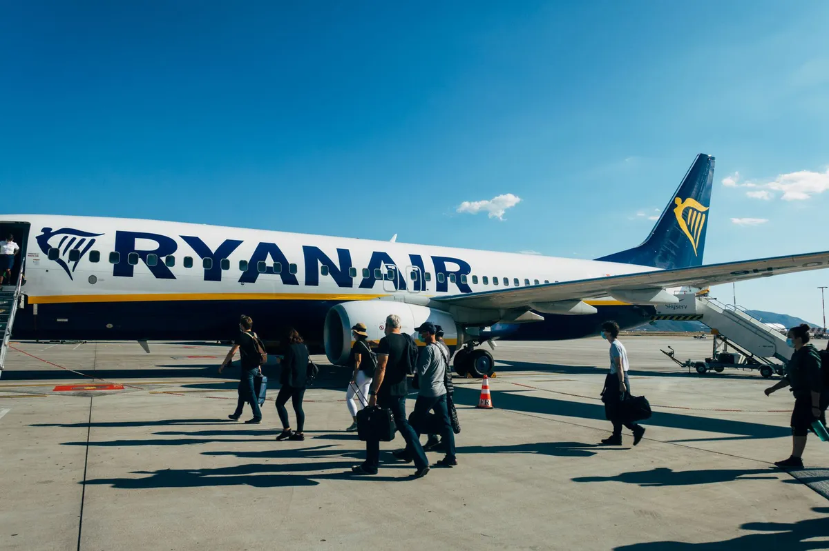 travelers boarding a plane
