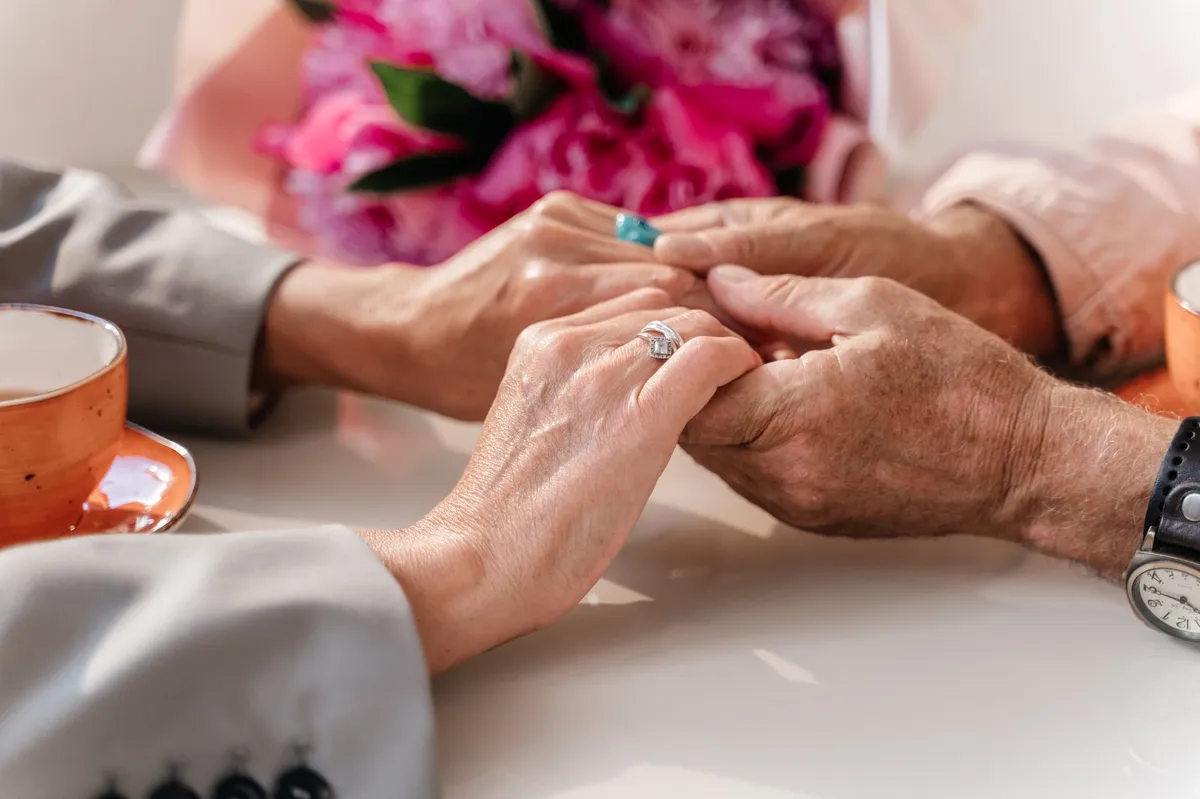 engaged elderly couple
