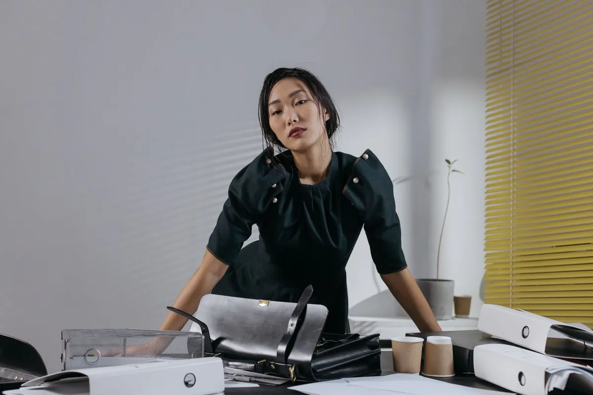 confident businesswoman at desk