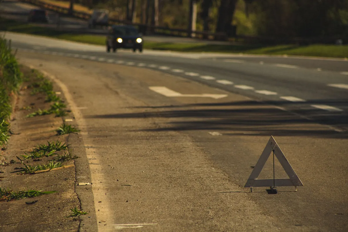 caution sign on highway