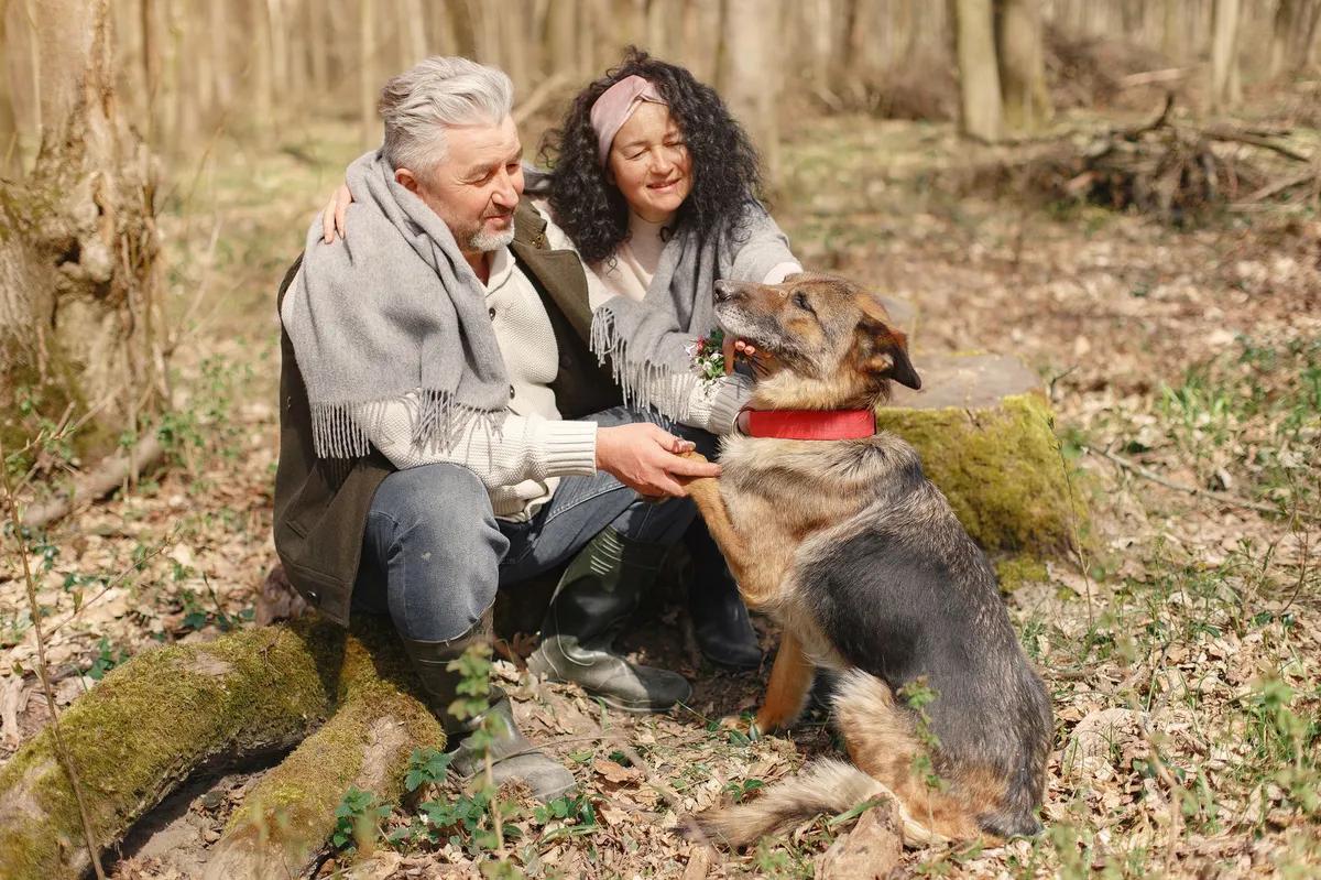 elderly couple with dog