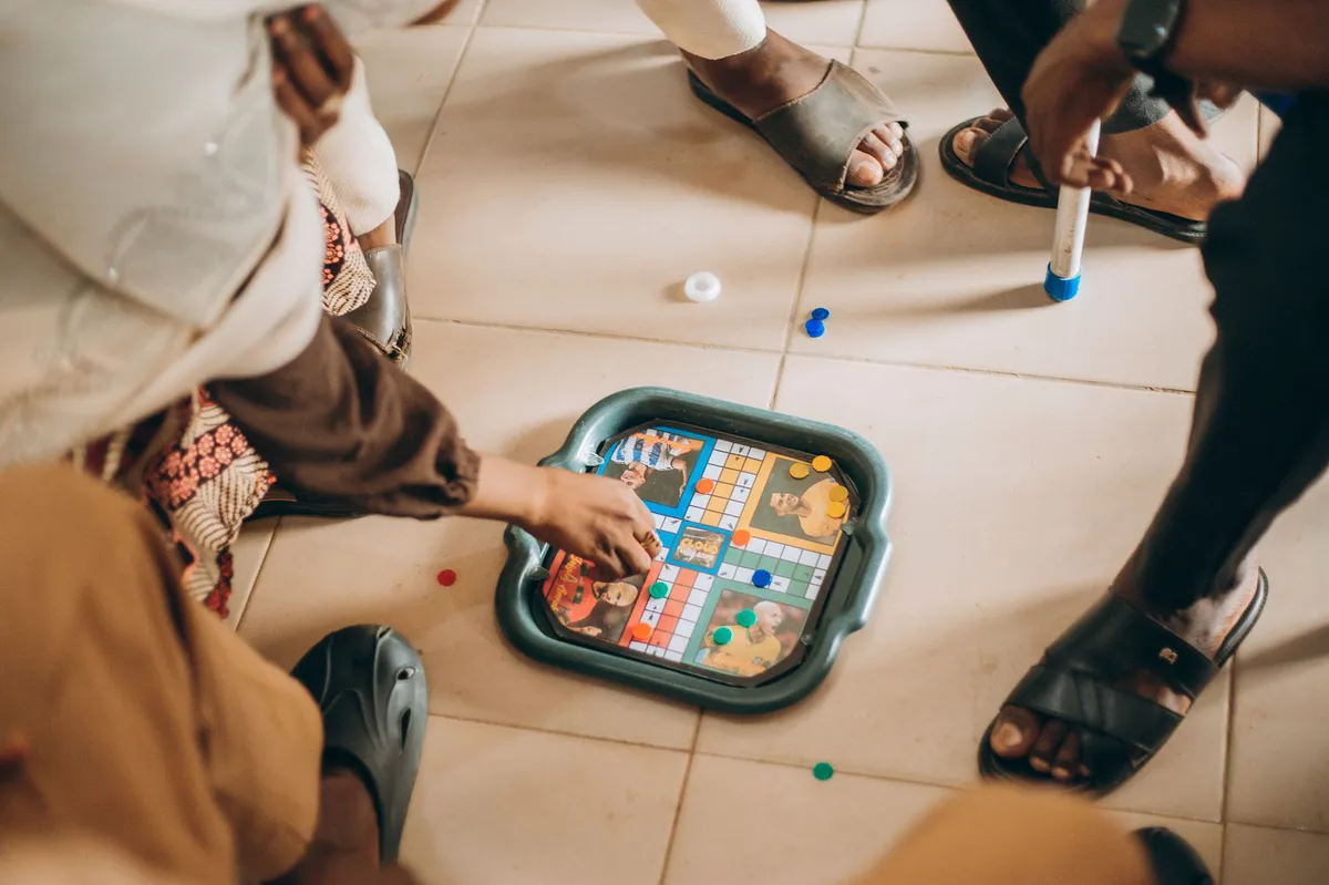 children playing board games