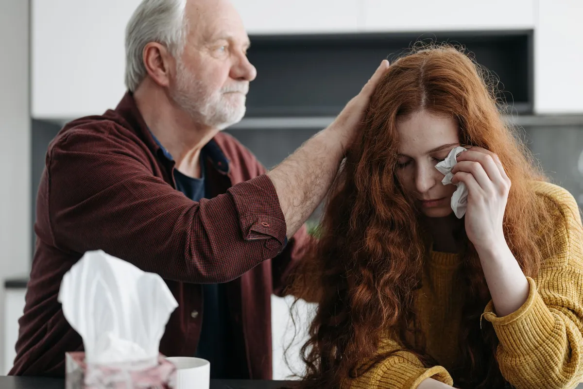 grieving spouse at home