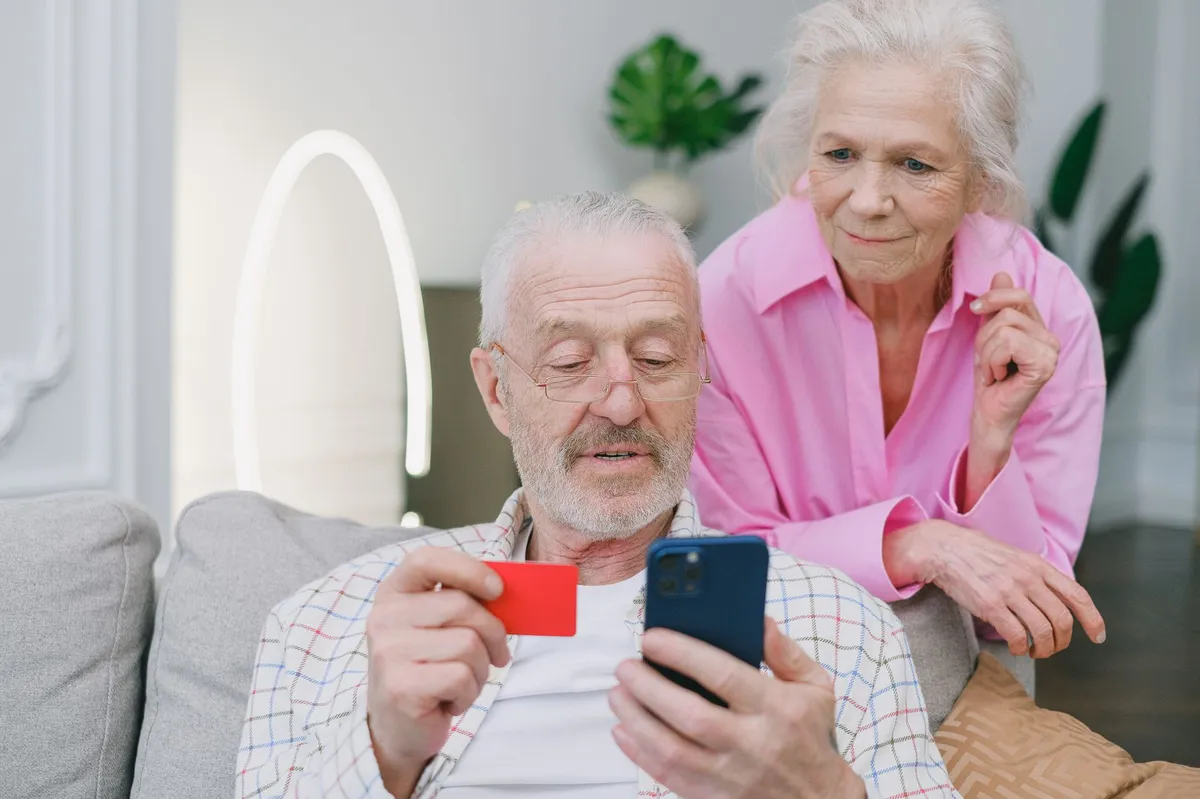 family using smartphone for finance