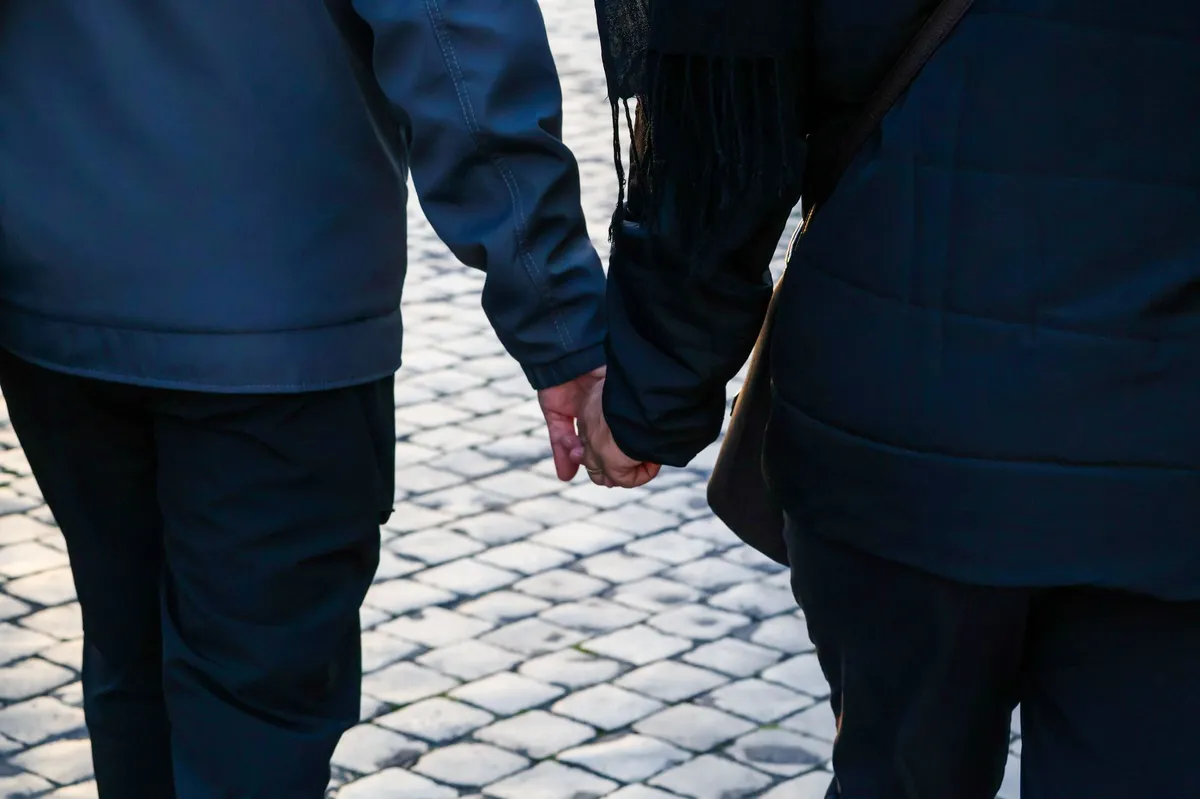couple walking hand in hand