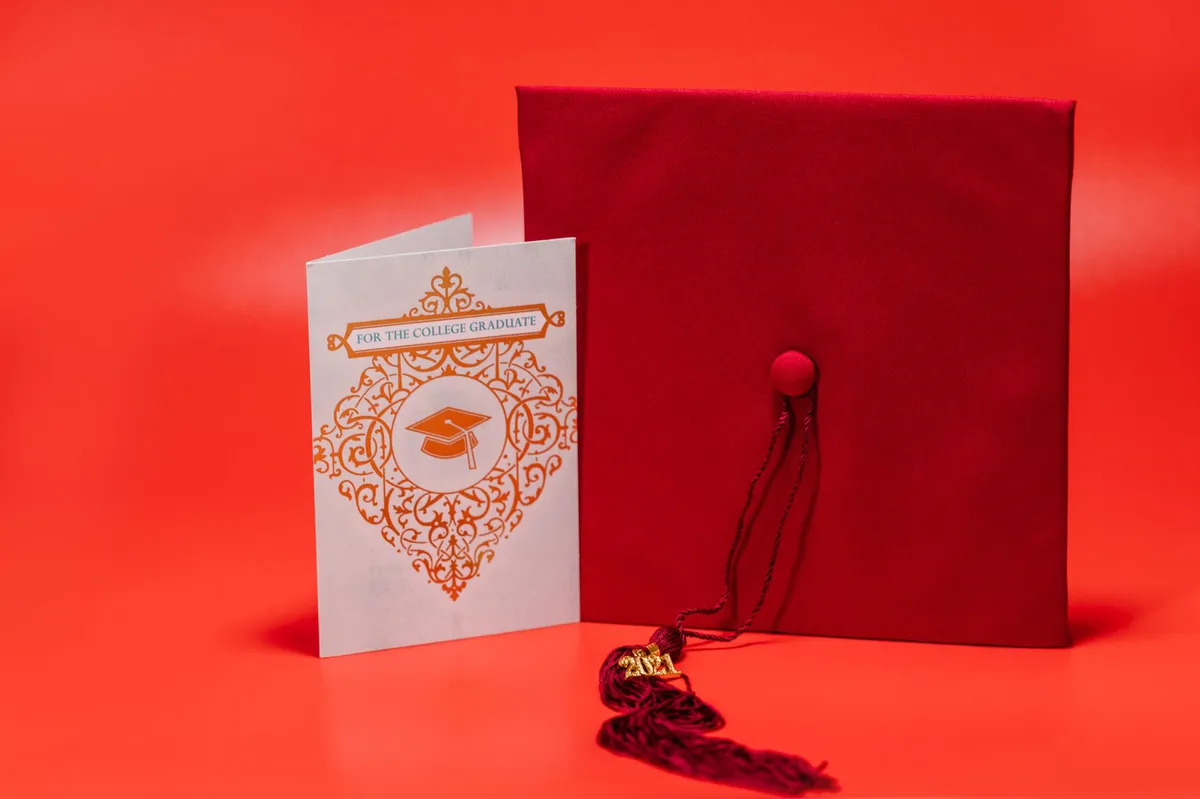 graduation cap and diploma