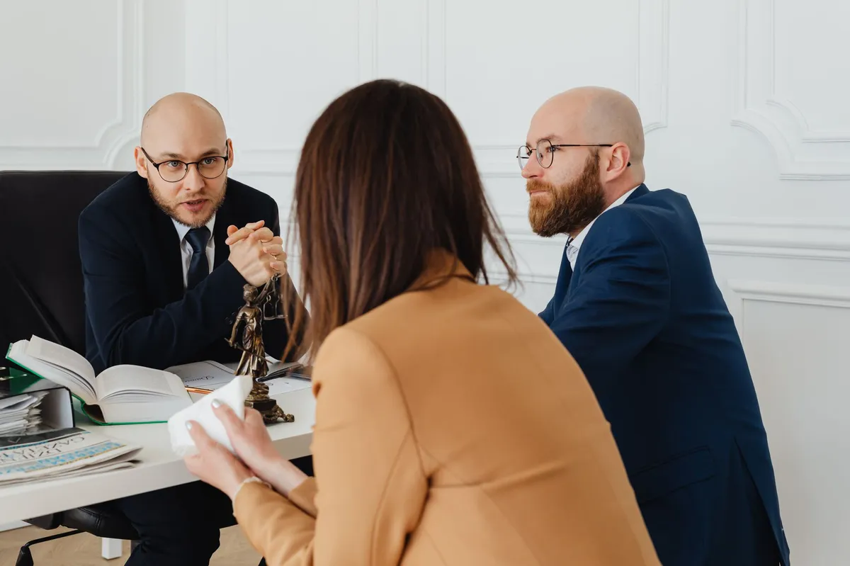 lawyer consulting with client