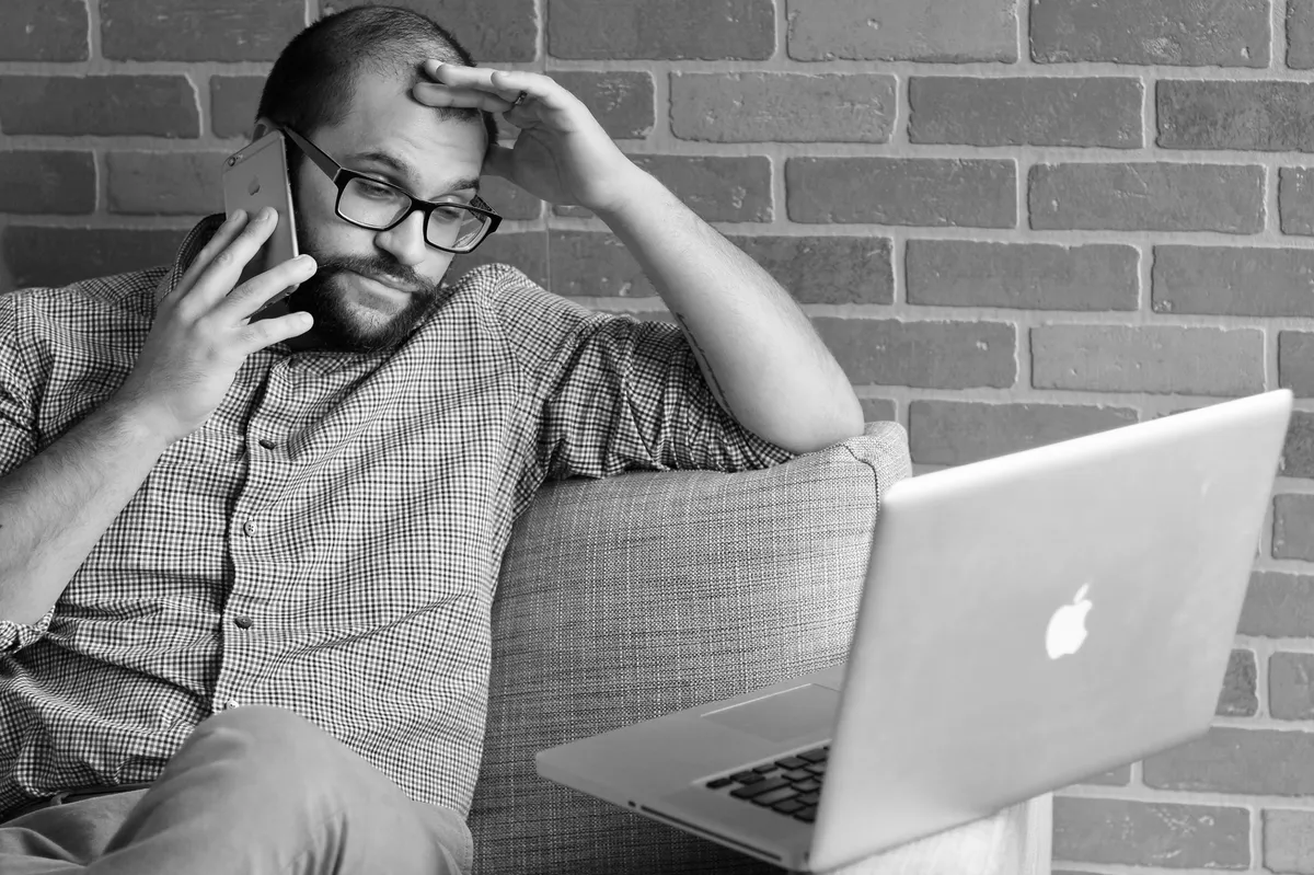 worried person on phone