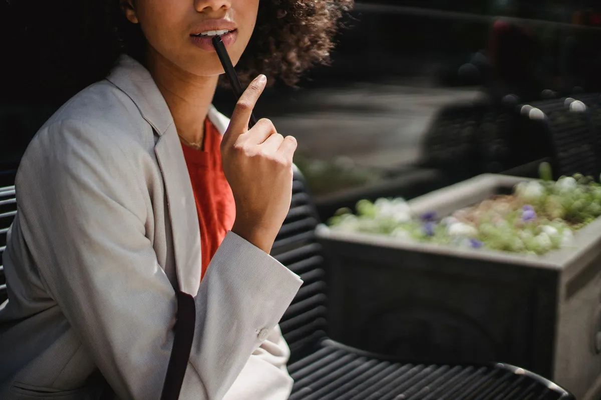 young professional woman contemplating
