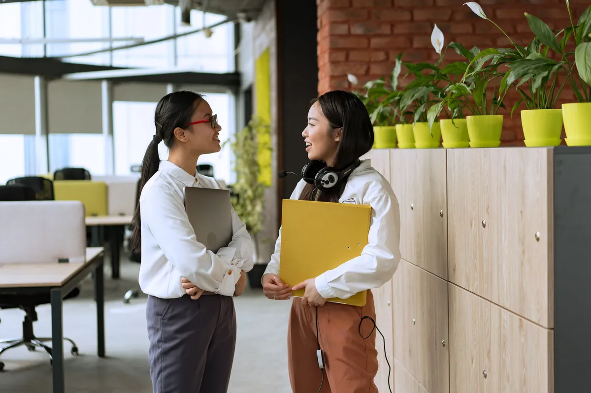 office workers discussing benefits