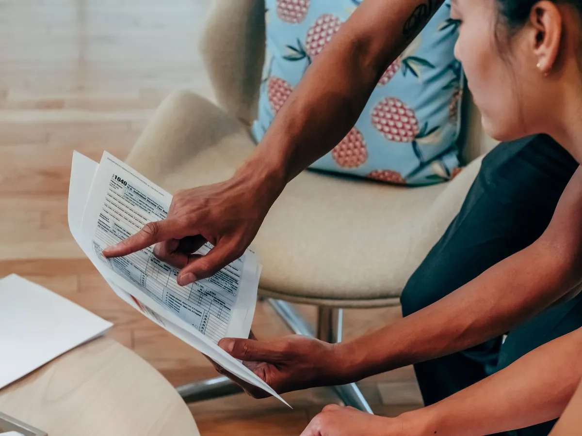 person reviewing financial documents