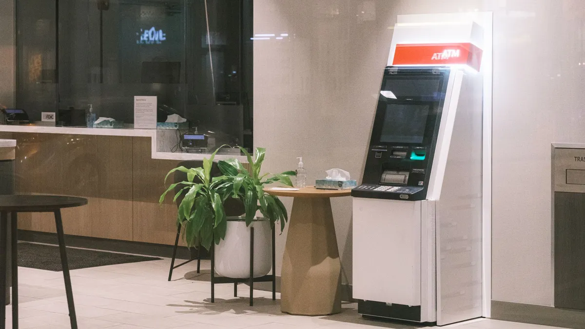 bank teller assisting customer