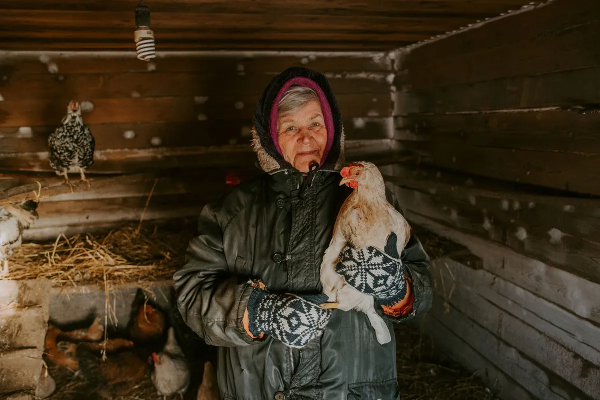 farmer with chickens
