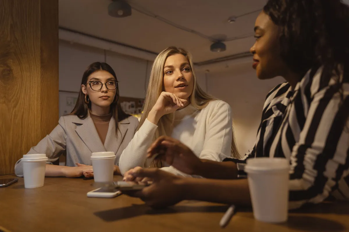 group of friends discussing finances