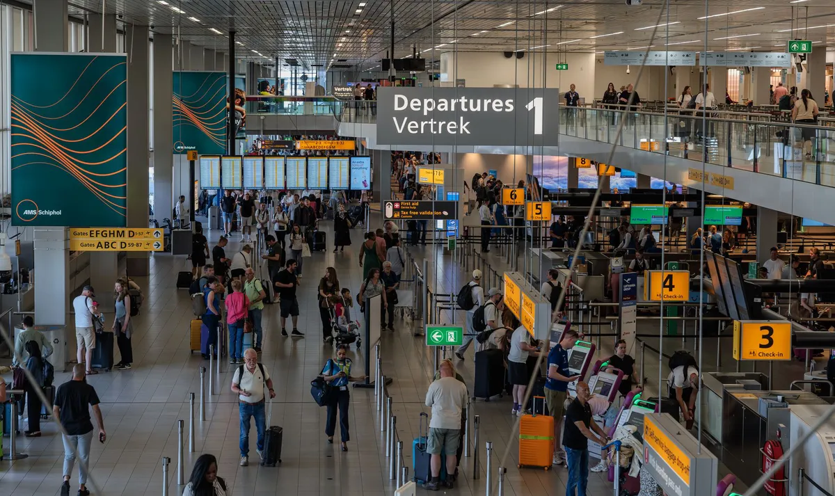 travelers checking in at airport