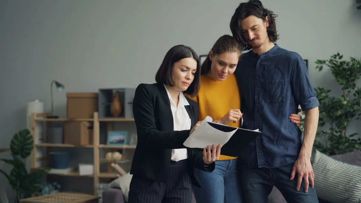 young couple discussing mortgage options