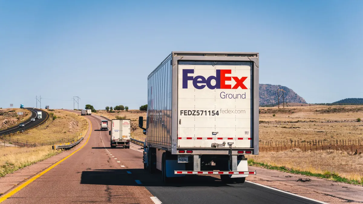 FedEx delivery truck on road