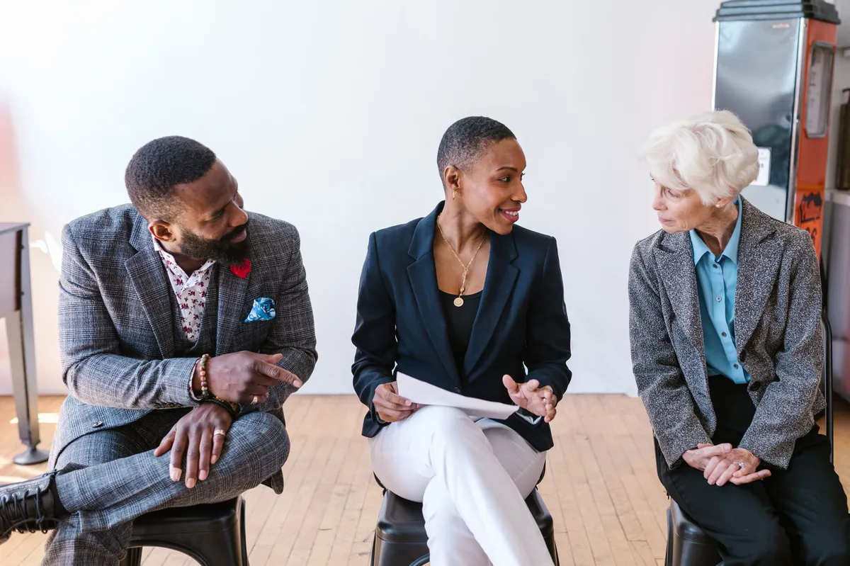 diverse group of investors discussing