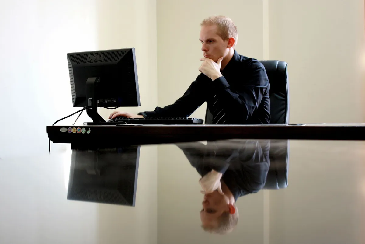 thoughtful executive at desk