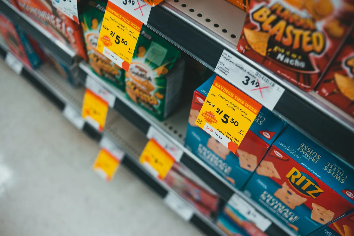 grocery store aisle with price tags