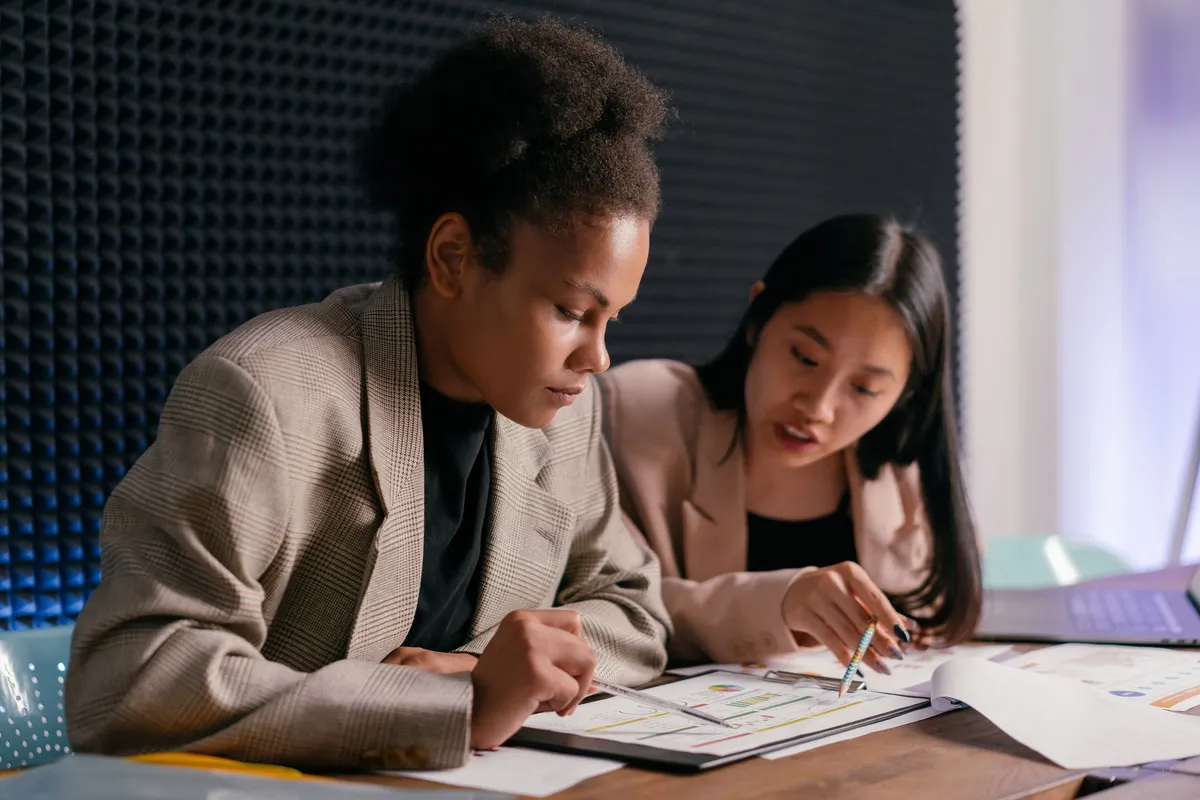 diverse women discussing finances